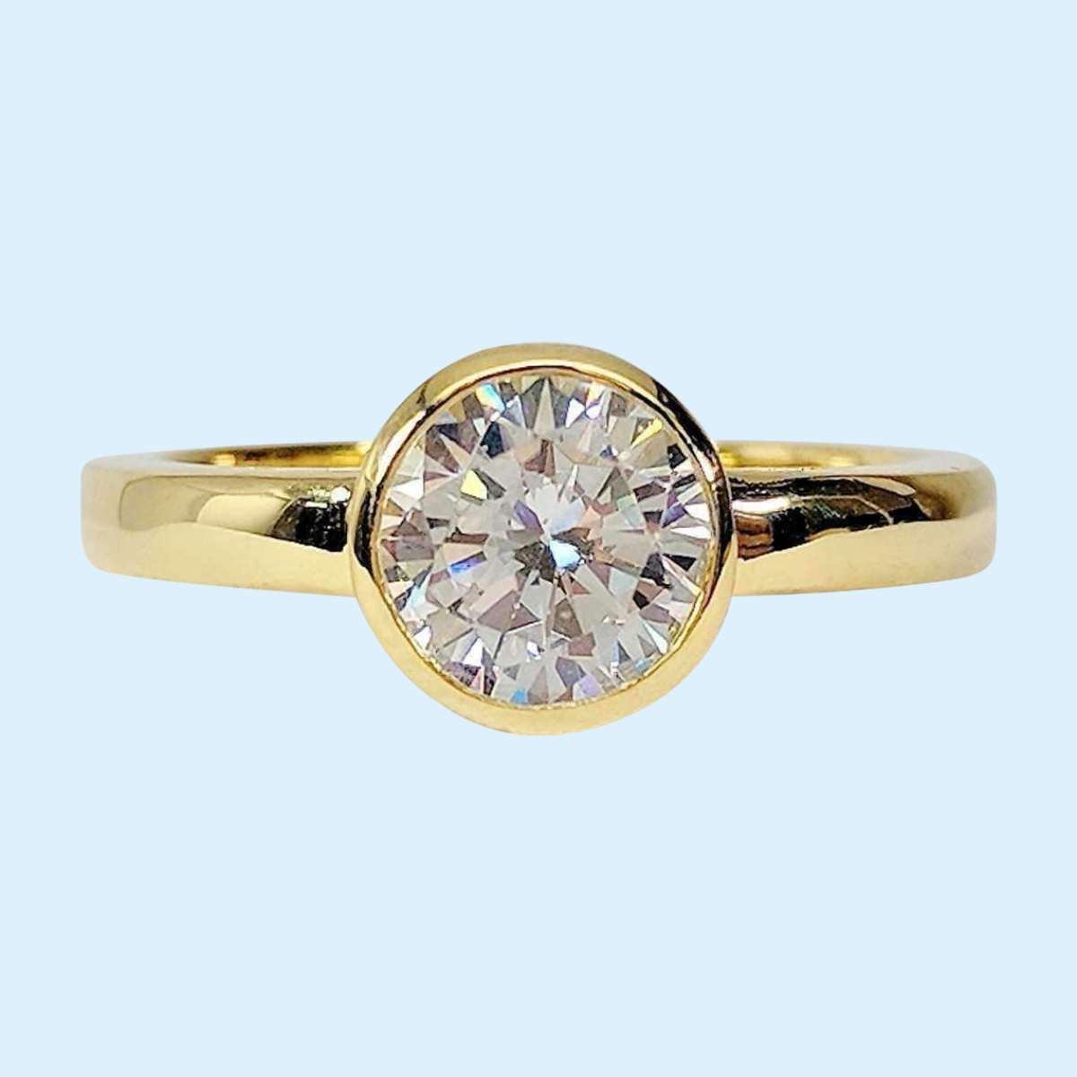 Coco D'ora 1.25CT Round Bezel Set OB Simulated Diamond Solitaire 18K Gold over Sterling Silver Ring for Women Bridal Engagement Wedding Anniversary Gift