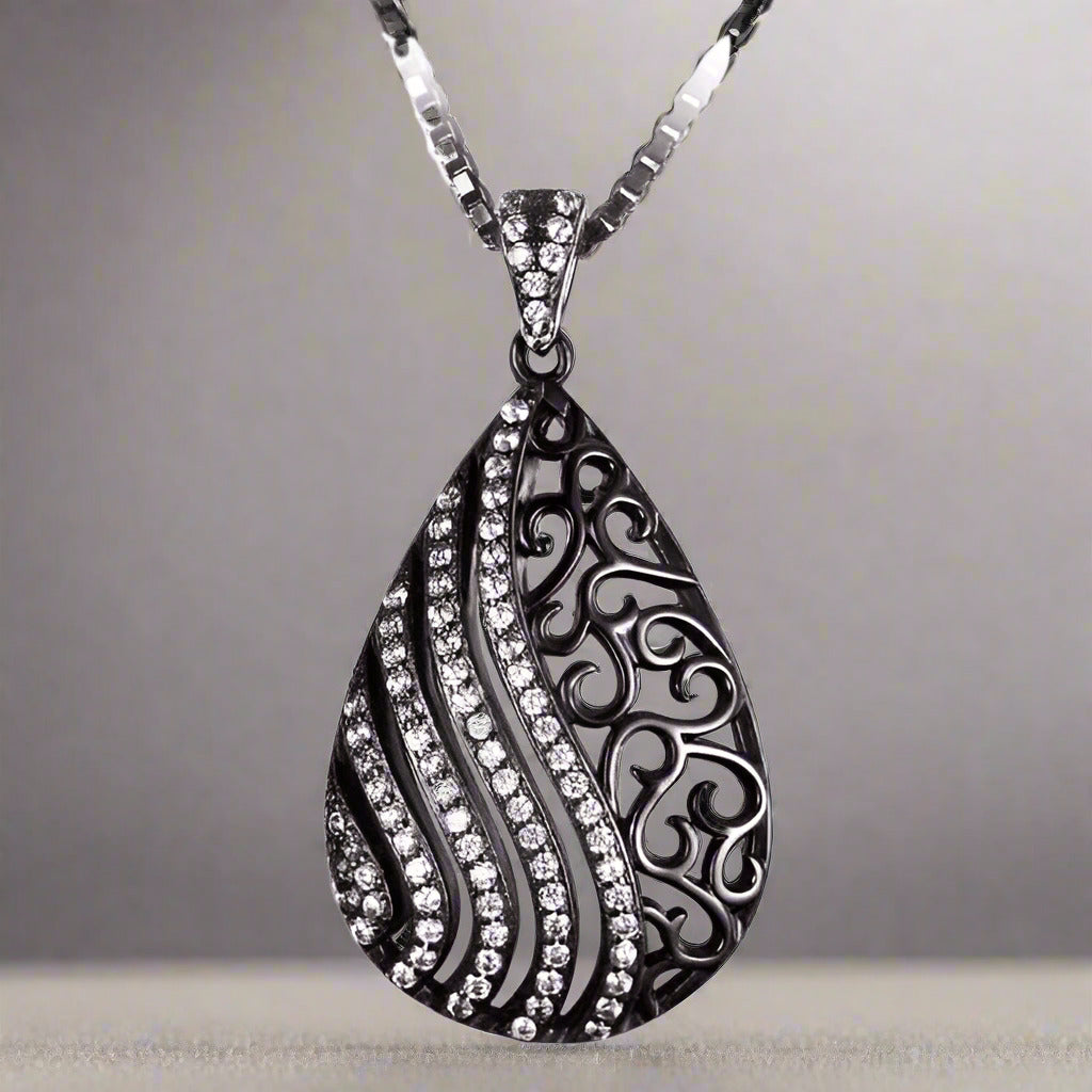 Feshionn IOBI Necklaces Black Ebony Swirl Black Gold Filigree and CZ Pendant Necklace