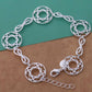 Infinite Medallion Silver Bracelet & Earrings Set