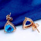 Feshionn IOBI Earrings Aqua Trillion Halo Zirconia Stud Earrings in 18K Rose Gold Plating