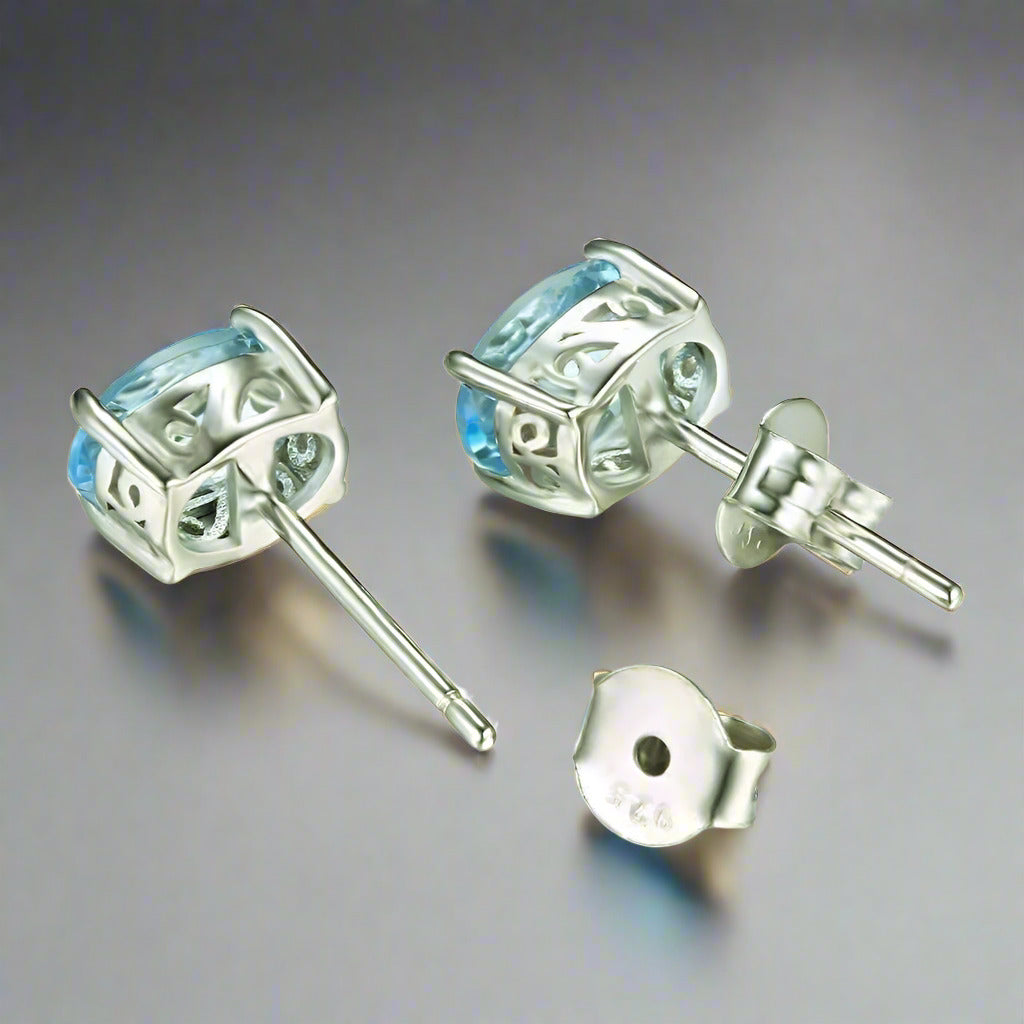 Feshionn IOBI Earrings Ice Blue Genuine Topaz Oval Cut 1.8 CT IOBI Precious Gems Stud Earrings