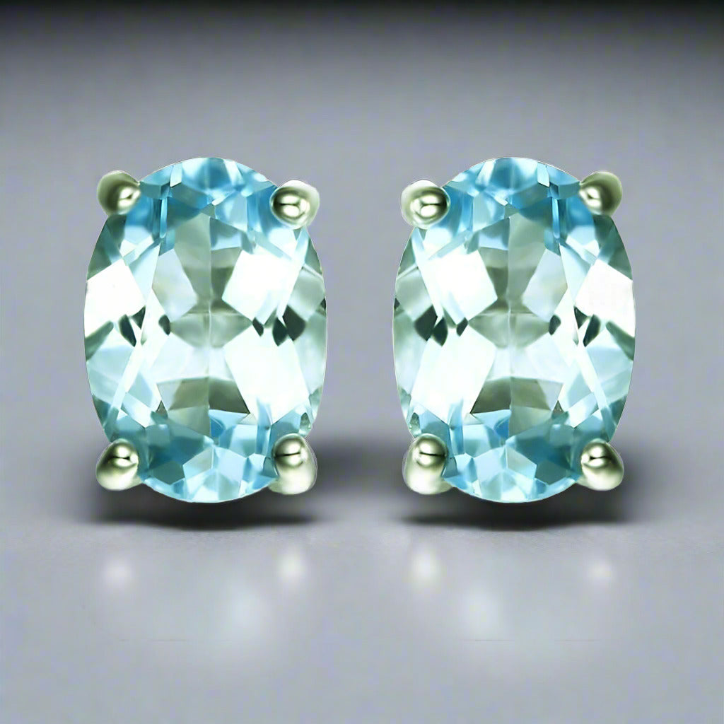 Feshionn IOBI Earrings Ice Blue Genuine Topaz Oval Cut 1.8 CT IOBI Precious Gems Stud Earrings