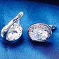 Feshionn IOBI Earrings Oval Solitaire Halo Earrings in Sapphire, Emerald, Topaz or White CZ