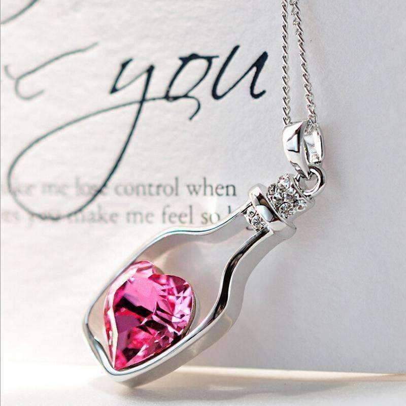 Feshionn IOBI Necklaces ON SALE - Bottled Up Love IOBI Crystals Necklace in Sapphire Pink