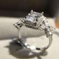Feshionn IOBI Rings Emerald Cut Butterfly Accented Cubic Zirconia Ring