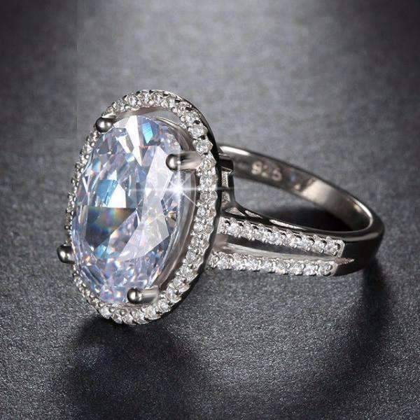 Feshionn IOBI Rings "Ingenue" 6 Carat Oval Halo White Gold Plated Split Shank Ring