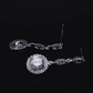 Pavé Triple Drop CZ Halo Earrings
